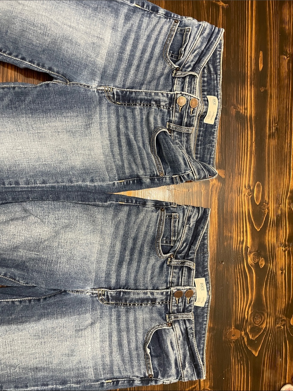 2 pair of Bke Parker universal fit high rise tailored boot cut jeans 26x31.5